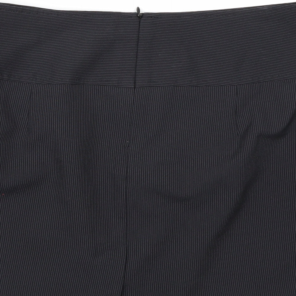 Brand and care label for Evie Collection women’s blue striped rayon a-line skirt, size UK 12