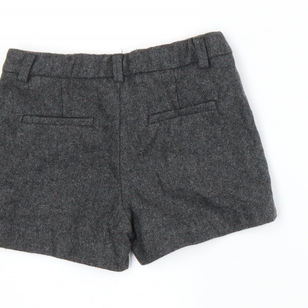 Brand and care label for Zara girls’ grey hot pants shorts, size 5, years