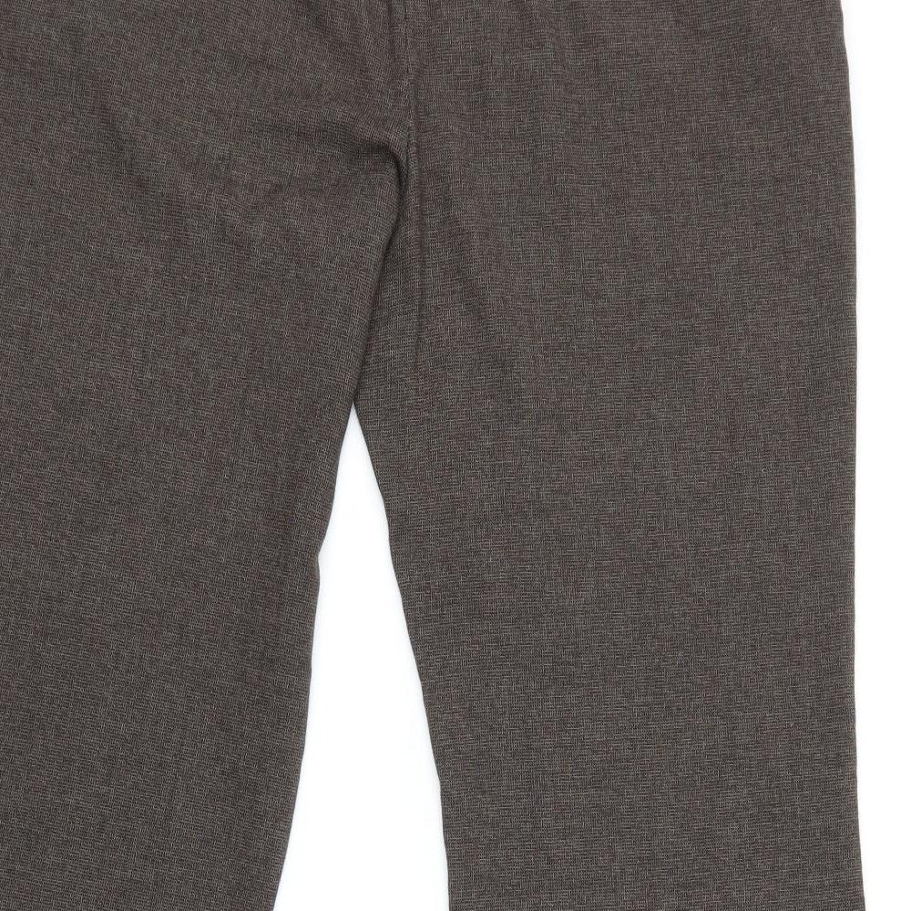 Brand and care label for Moda women’s brown trousers, size UK 16