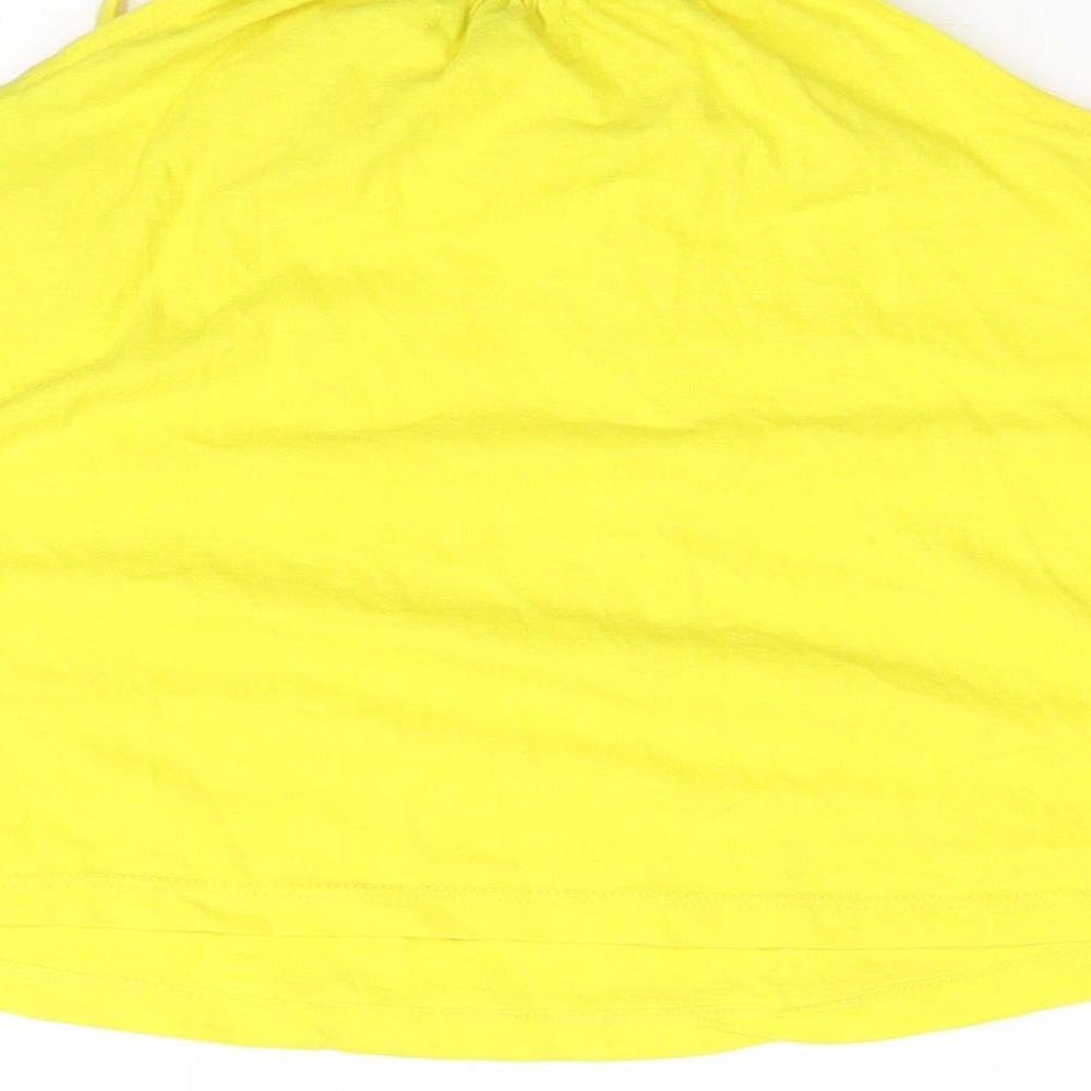 Brand and care label for Marks & Spencer girls’ yellow basic t-shirt, size 5-6, years