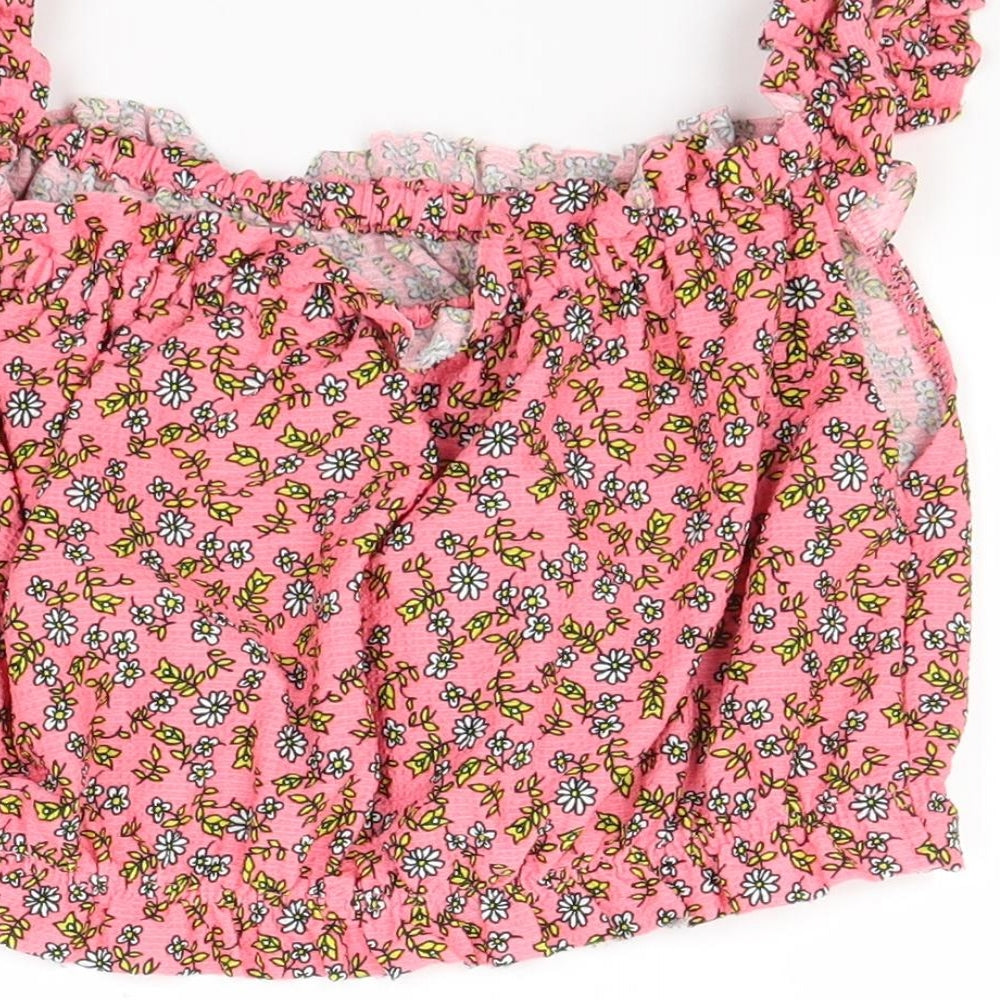Brand and care label for Topshop women’s red floral cropped t-shirt, size UK 10