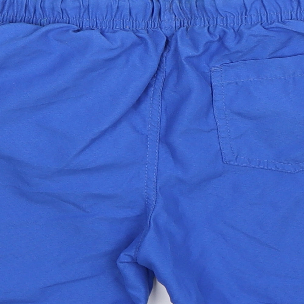 Brand and care label for Rebel boys’ blue bermuda shorts, size 8-9, years