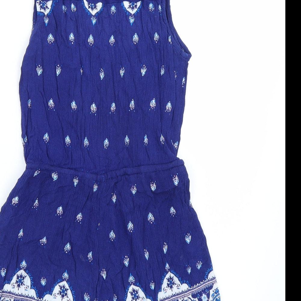 Brand and care label for H&M women’s blue playsuit one-piece, size UK 4