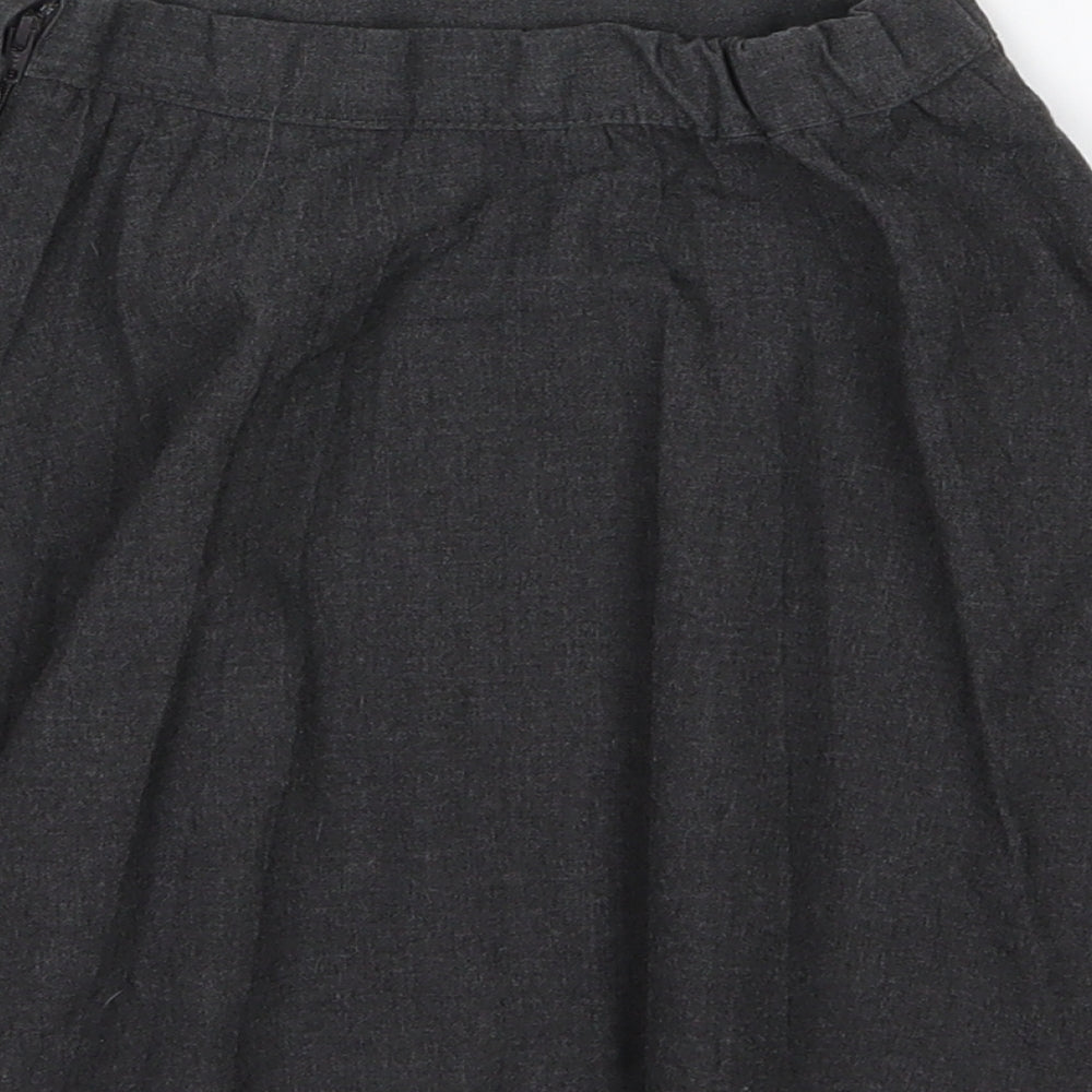 Brand and care label for George girls’ grey rayon pleated skirt, size 4-5, years