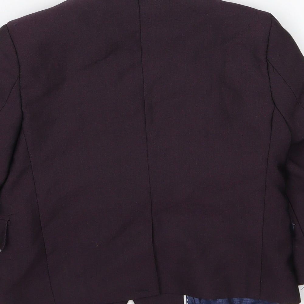 Brand and care label for St Chiman boys’ purple jacket, size 2, years