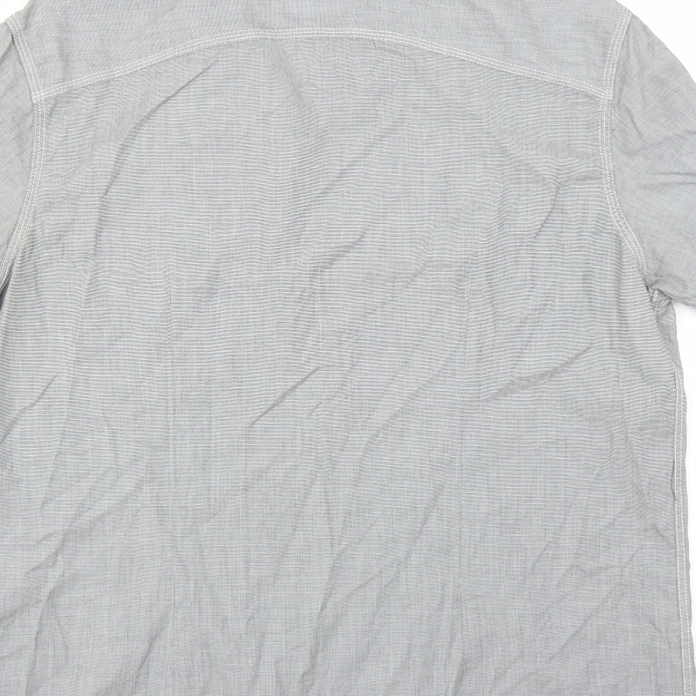Brand and care label for Burton men’s grey button-up, size L
