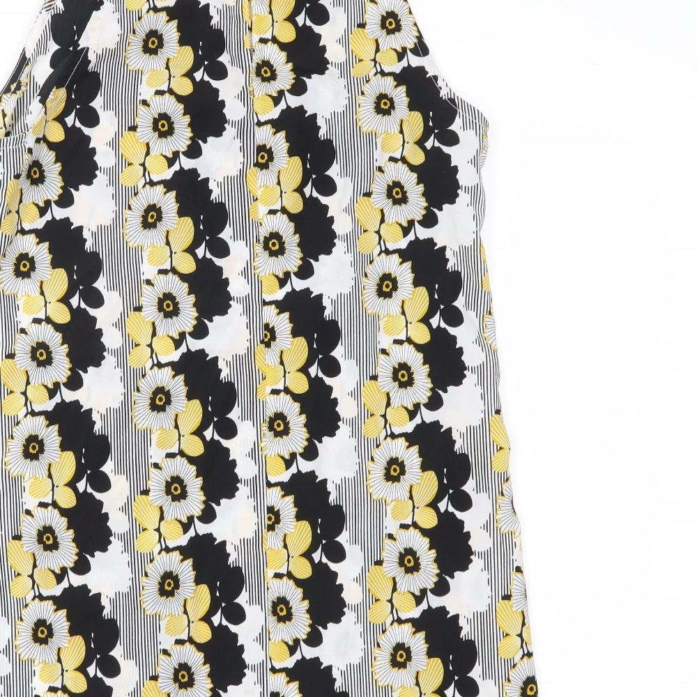 Brand and care label for Miss Selfridge women’s black floral chiffon basic blouse, size UK 10