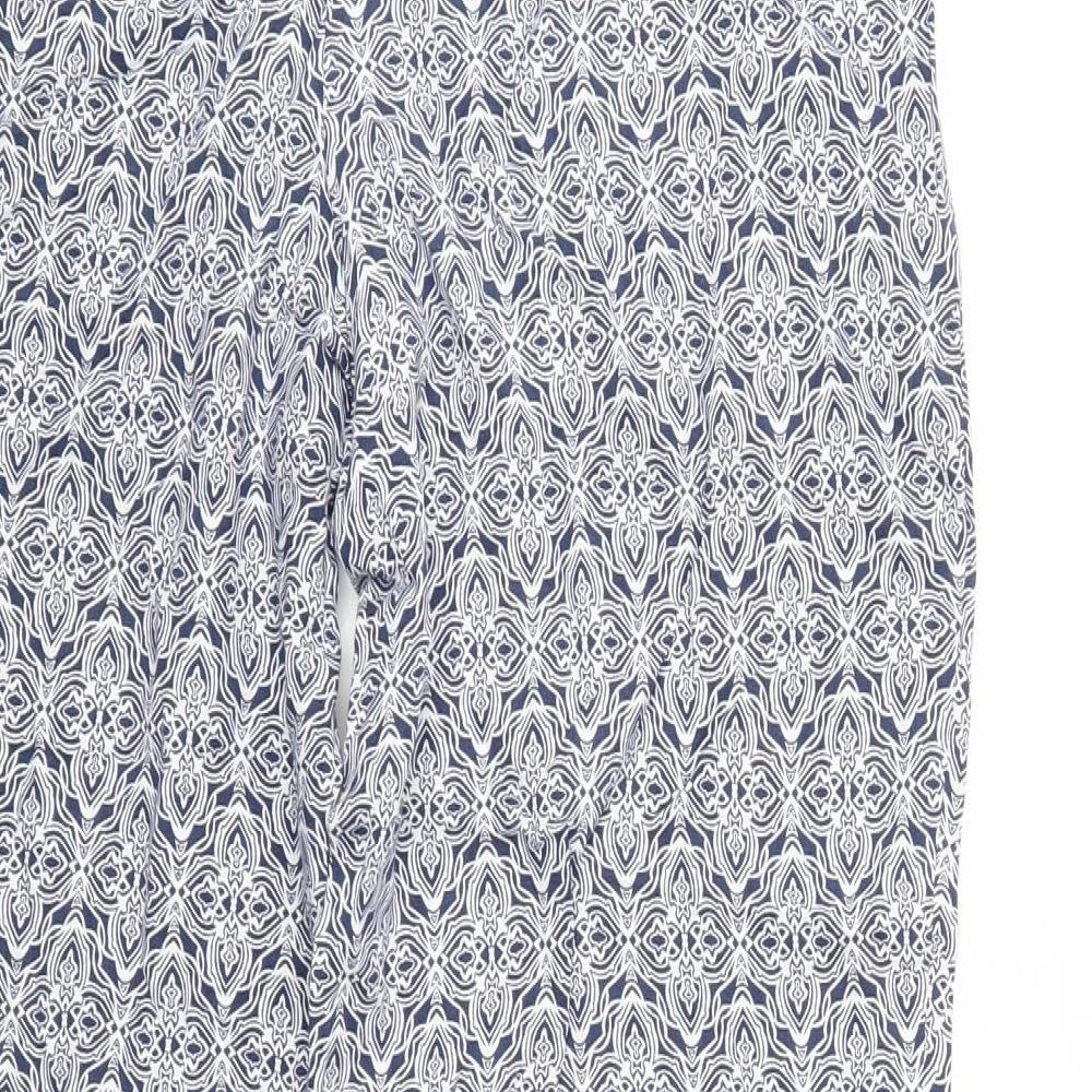 Brand and care label for Marks & Spencer women’s blue floral trousers, size UK 10, 26-inch leg