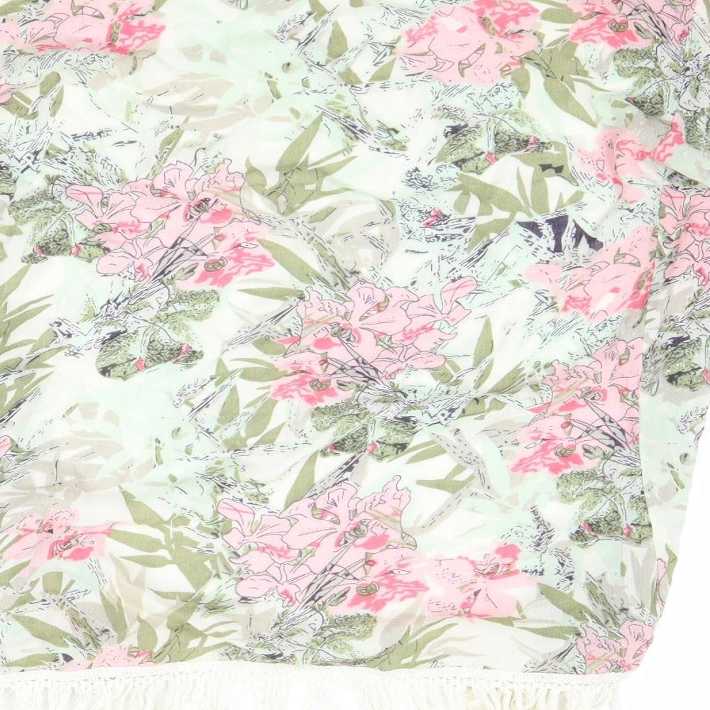 Brand and care label for Preworn women’s green floral basic blouse, size S