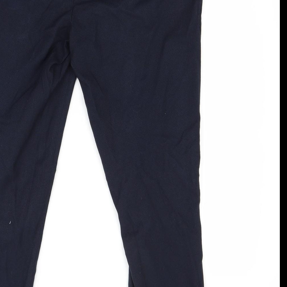 Brand and care label for top man men’s blue trousers, size 32, 29-inch leg