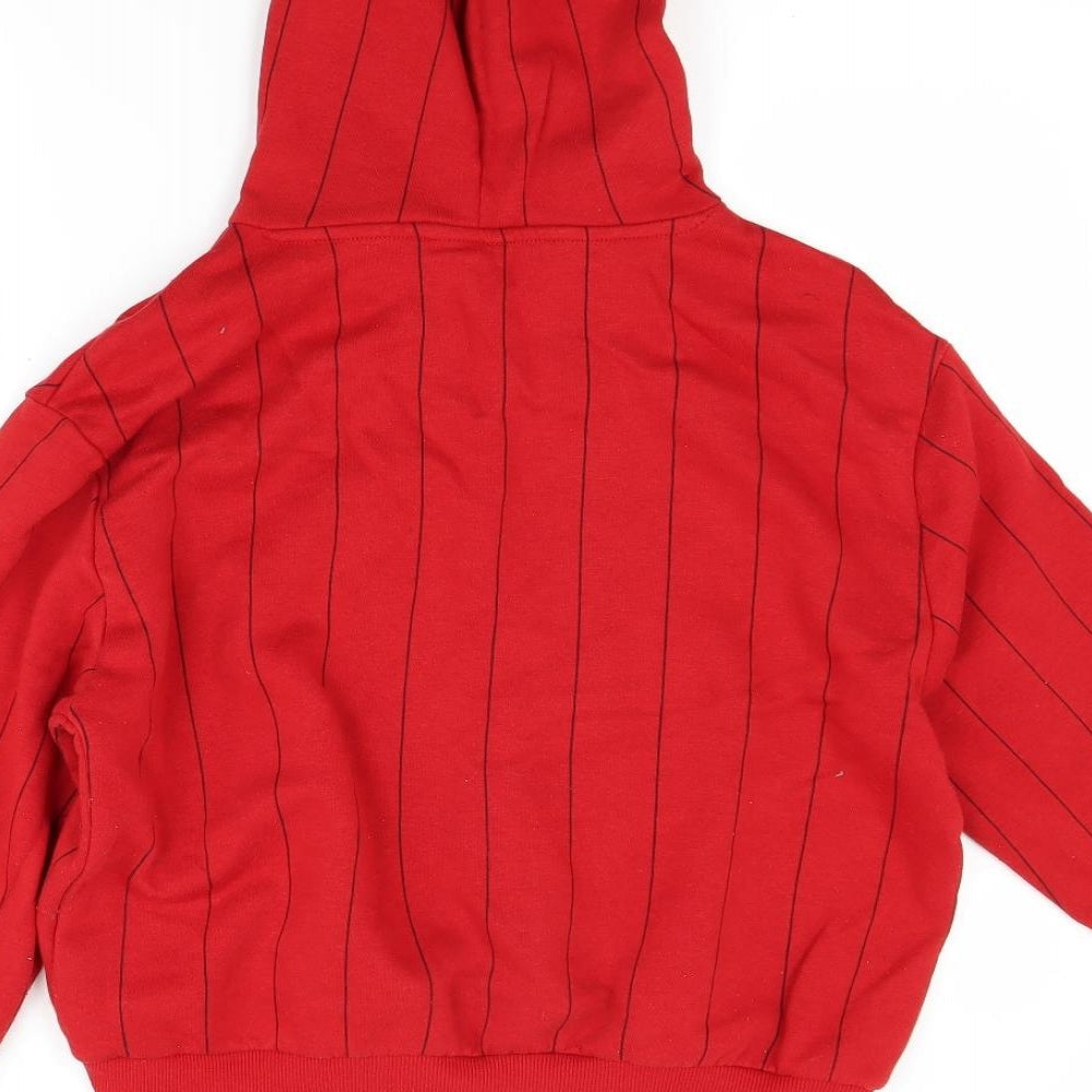 Brand and care label for Divided women’s red pullover hoodie, size M