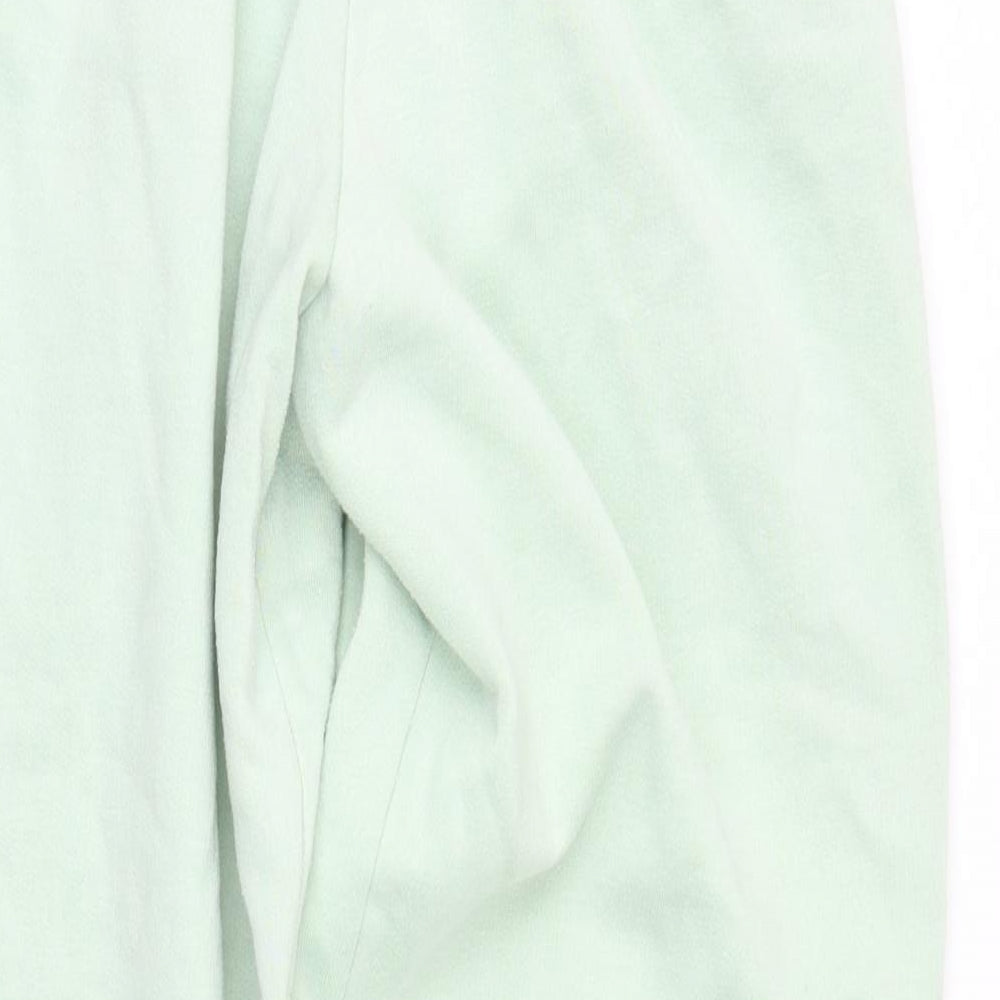 Brand and care label for nuggets women’s green sweatpants, size M, 26-inch leg
