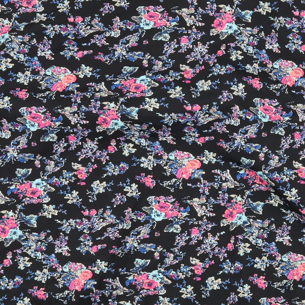 Brand and care label for New Look girls’ black floral jacket, size S