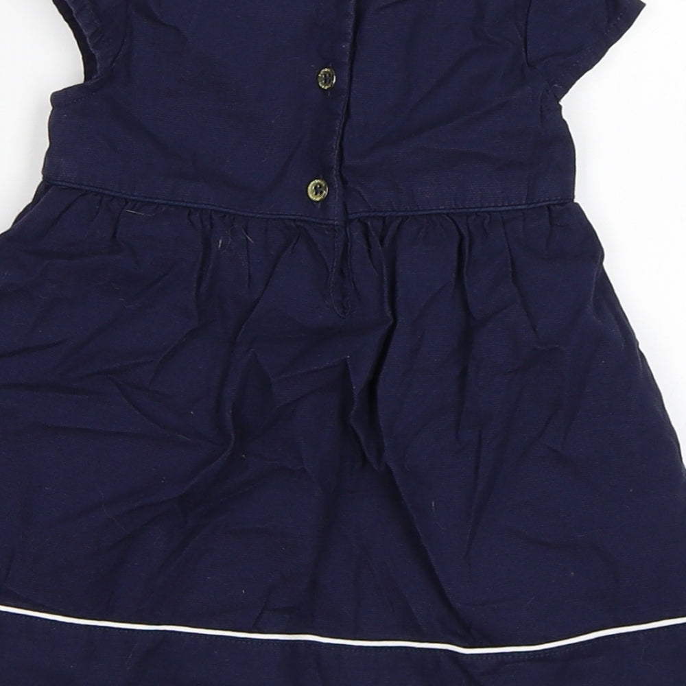 Brand and care label for Marks & Spencer girls’ blue fit & flare, size 0-3, months