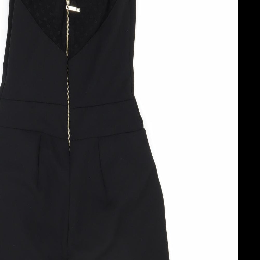 Brand and care label for women’s black shorts one-piece, size UK 8