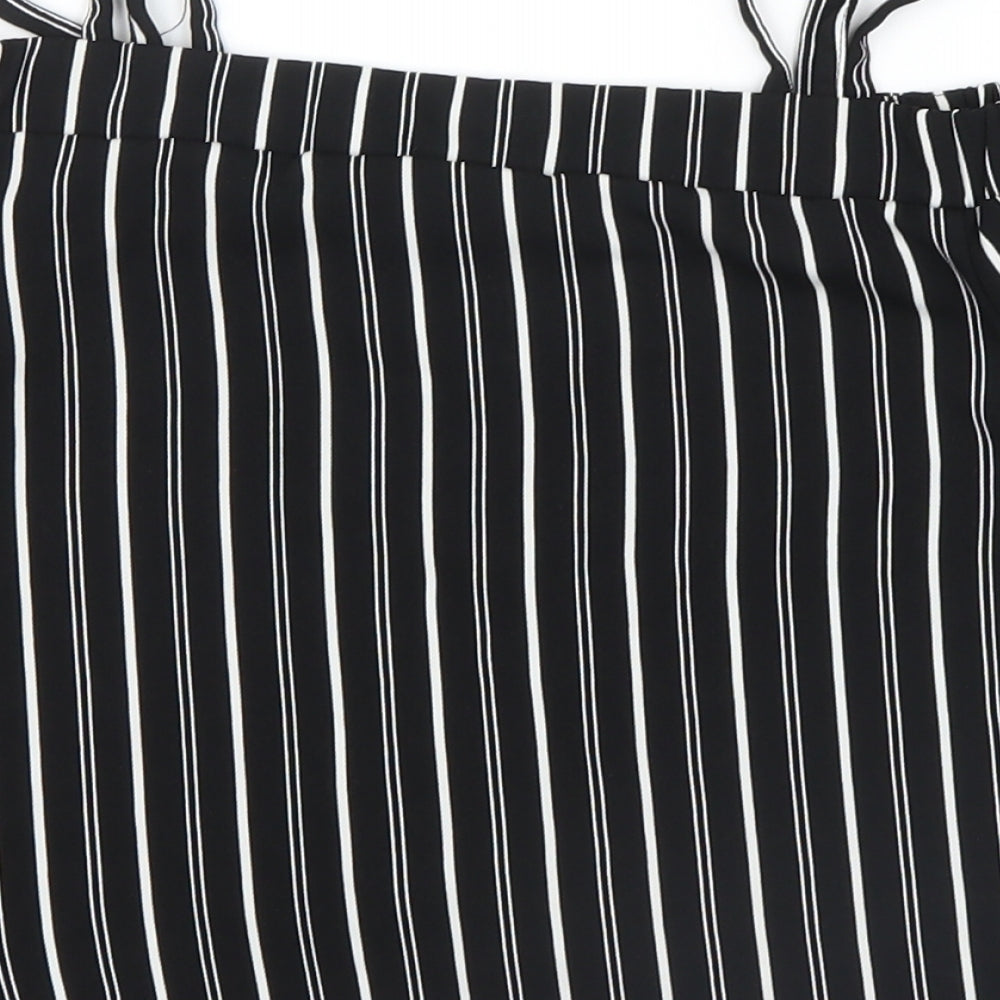 Brand and care label for Primark girls’ black striped basic casual, size 10-11, years