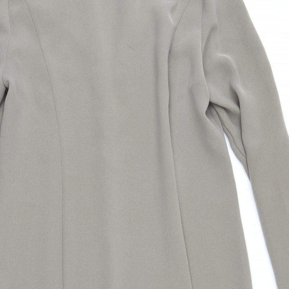 Brand and care label for Frank Walder women’s beige jacket, size UK 12