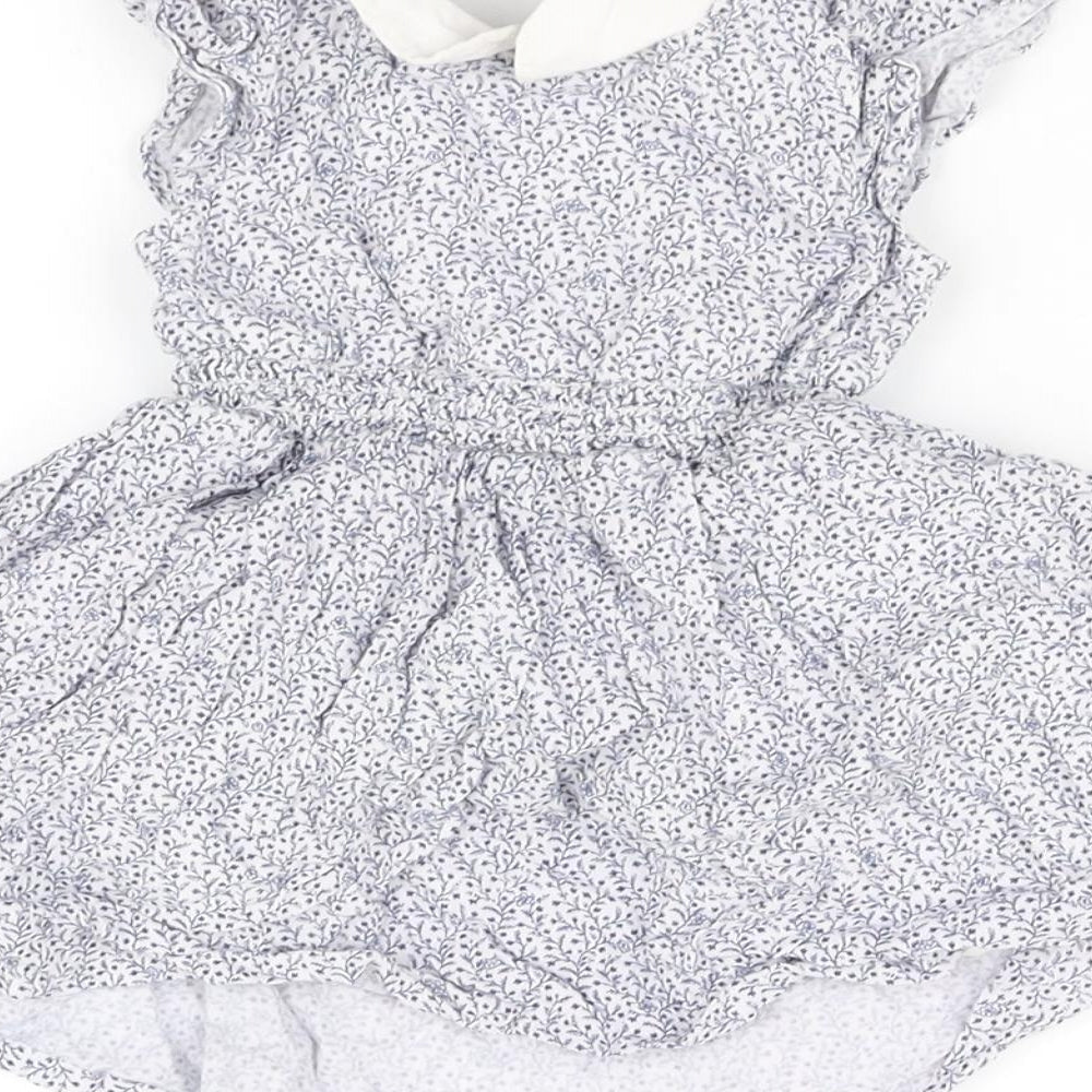 Brand and care label for pre worn girls’ blue fit & flare, size 3-6, months