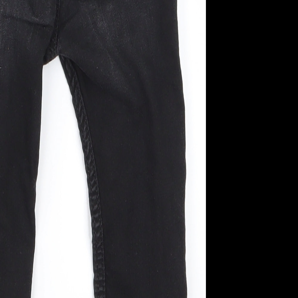 Brand and care label for H&M girls’ black cargo jeans, size 12-18, months