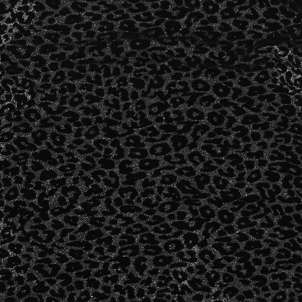 Brand and care label for Tu girls’ black animal print pullover sweatshirt, size 12, years