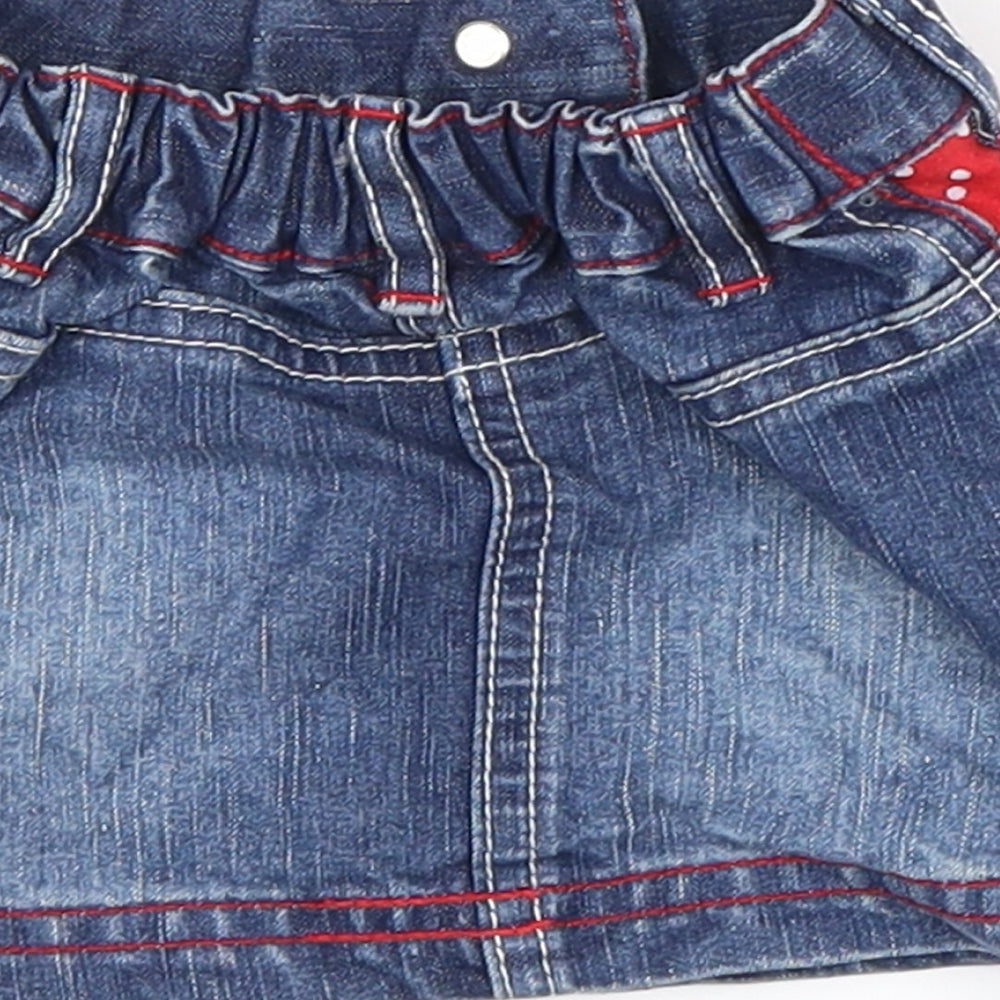 Brand and care label for Next Blue Mini Skirt, size 3-6, Months