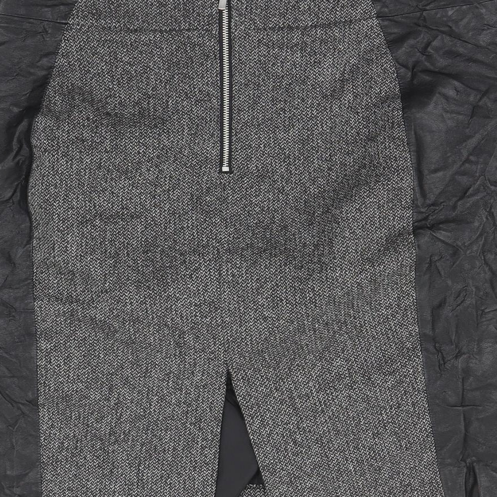 Brand and care label for H&M women’s black herringbone straight & pencil skirt, size UK 10
