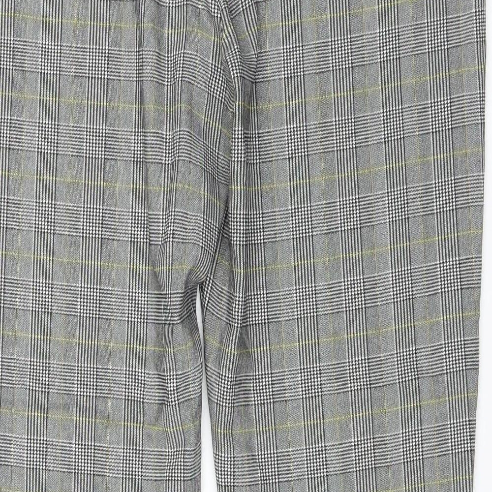 Brand and care label for New Look women’s red plaid trousers, size UK 38, in, 29-inch leg