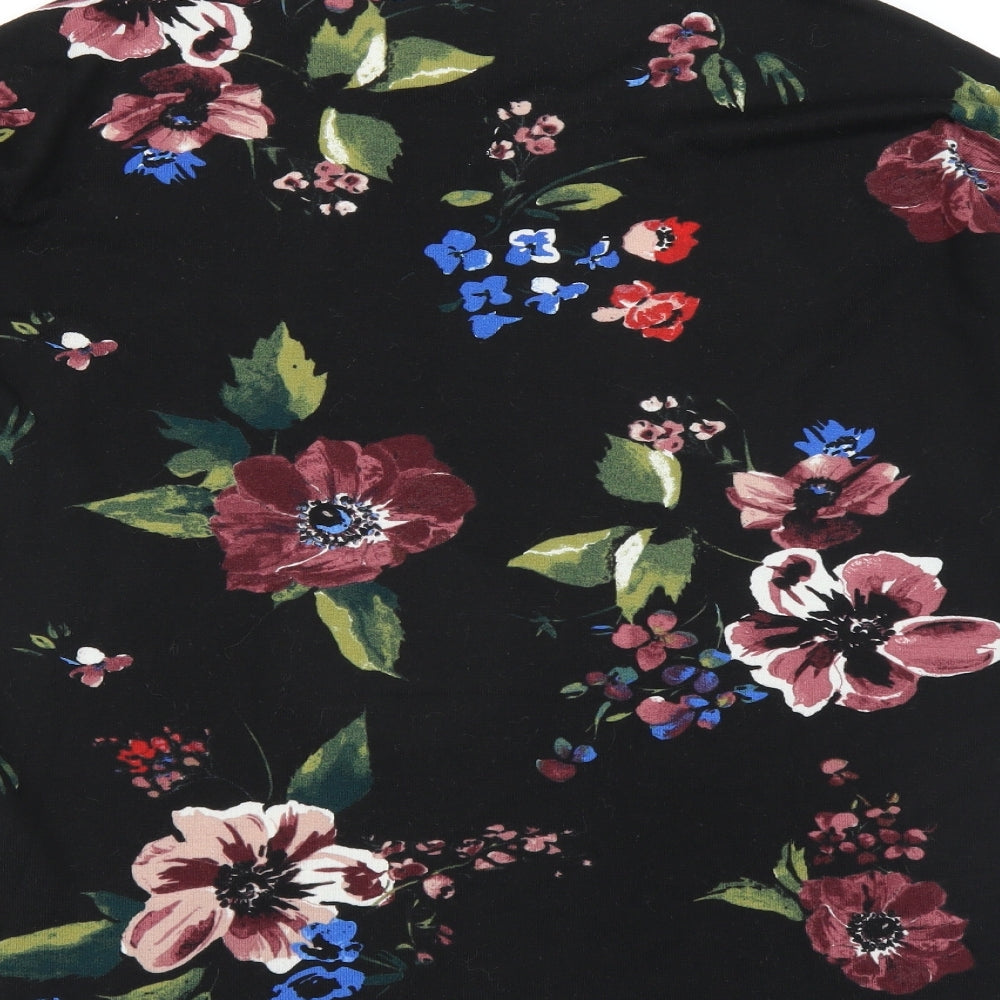Brand and care label for Vero Moda women’s black floral jumper, size M
