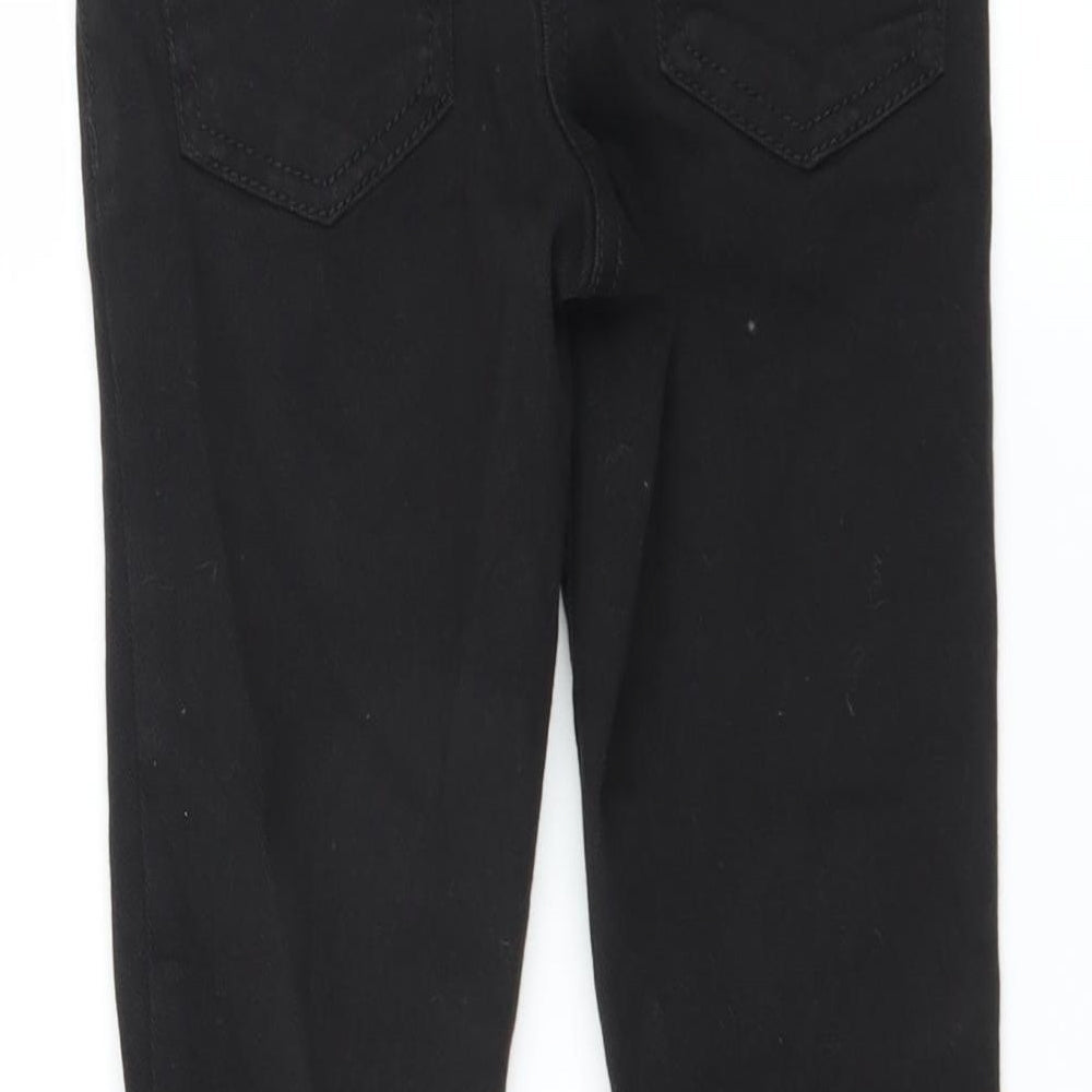 Brand and care label for Next girls’ black skinny jeans, size 8, years - distressed