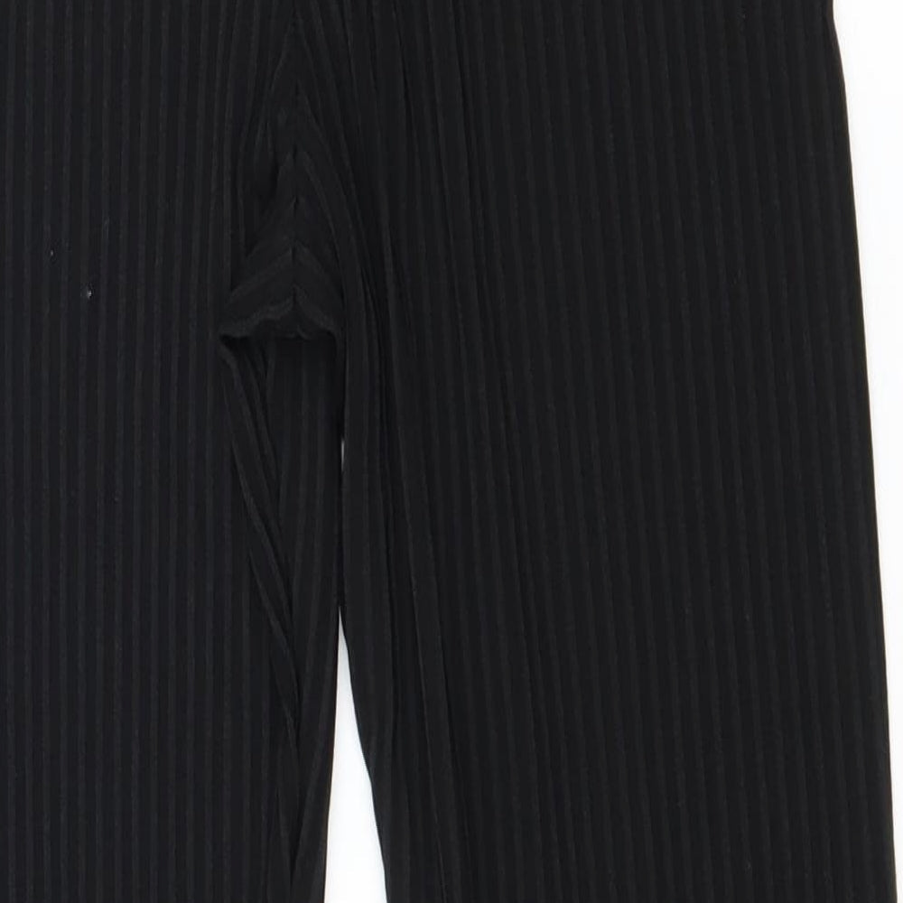 Brand and care label for Boohoo women’s black jersey trousers, size UK 8, 25-inch leg