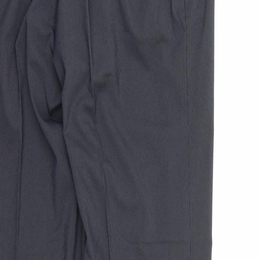 Brand and care label for Marks & Spencer men’s blue striped rayon dress pants trousers, 29-inch leg