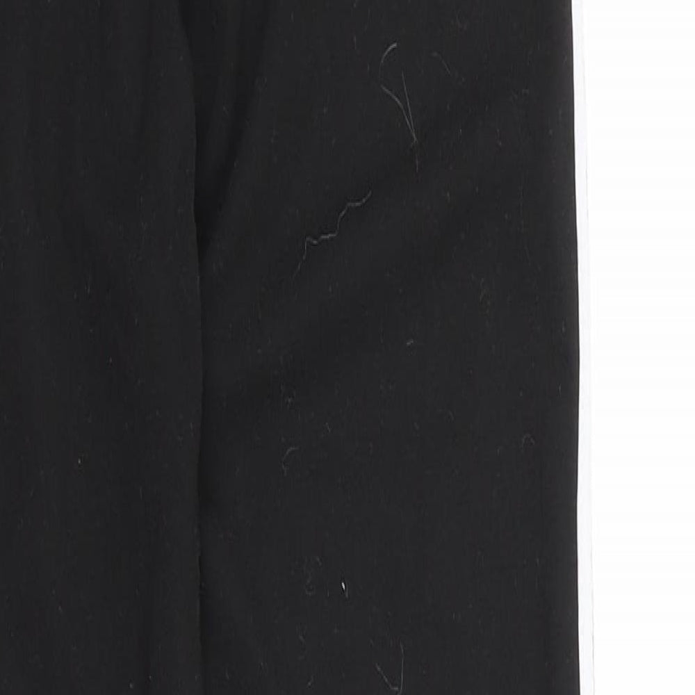 Brand and care label for D&A girls’ black capri trousers, size M, - leggings