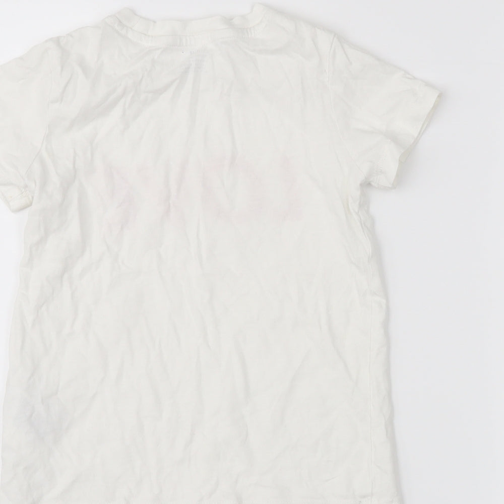 Brand and care label for H&M girls’ white pullover t-shirt, size 3-4, years