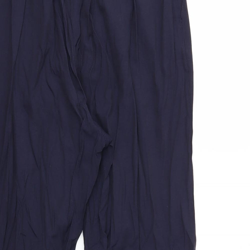 Brand and care label for Preworn women’s blue trousers, size L, 29-inch leg