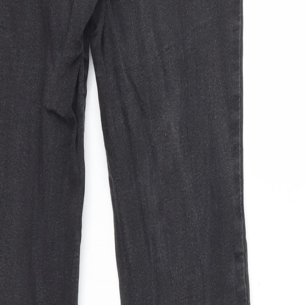 Brand and care label for SHAPE women’s black denim skinny jeans, size S, 31-inch leg