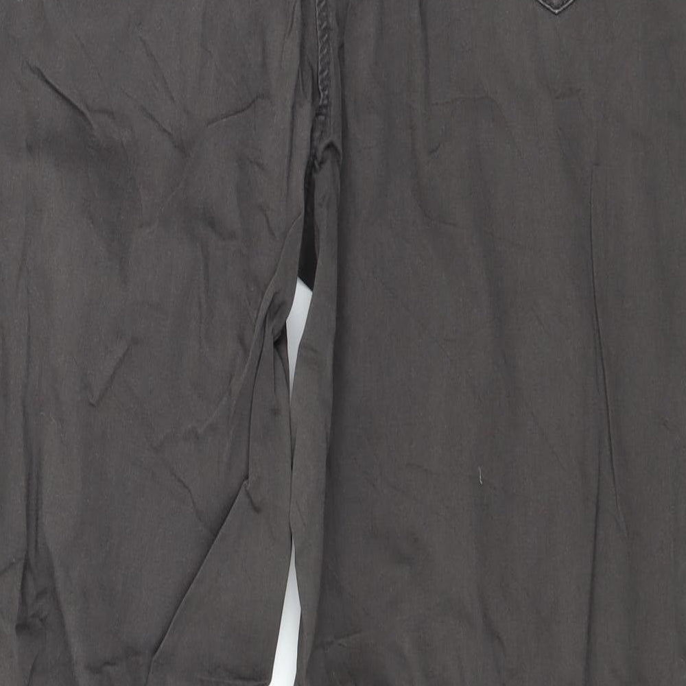 Brand and care label for Gelco women’s grey trousers, size UK 34, in, 27-inch leg