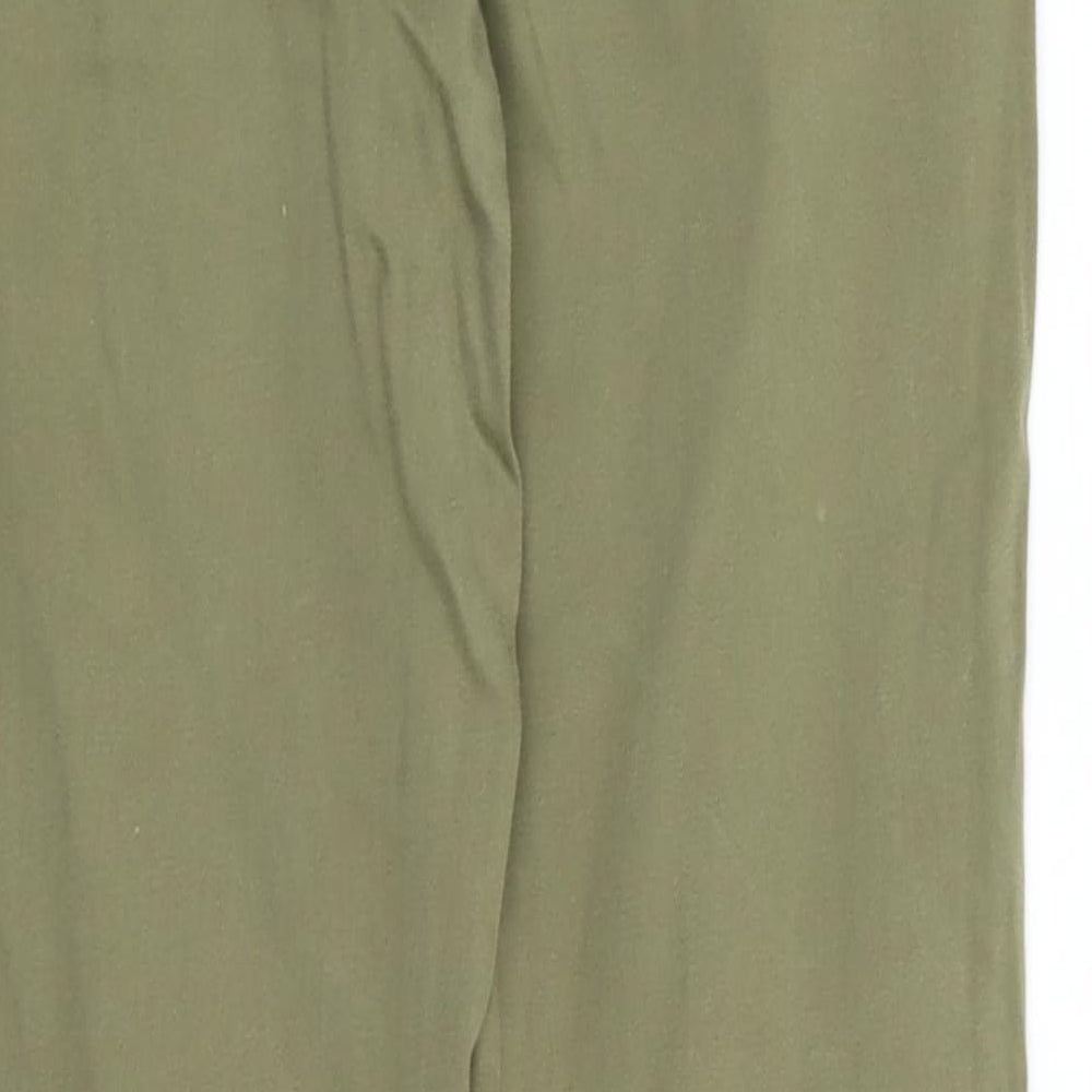 Brand and care label for Denim CO girls’ green skinny jeans, size 13-14, years
