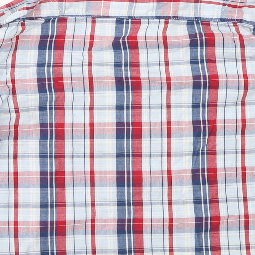 Brand and care label for Dunnes boys’ black check basic button-up, size 5, years