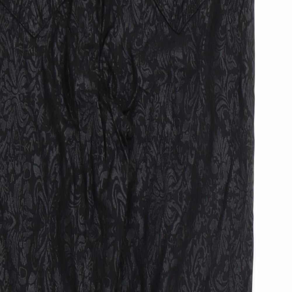 Brand and care label for luccd women’s black floral trousers, size UK 8, 23-inch leg