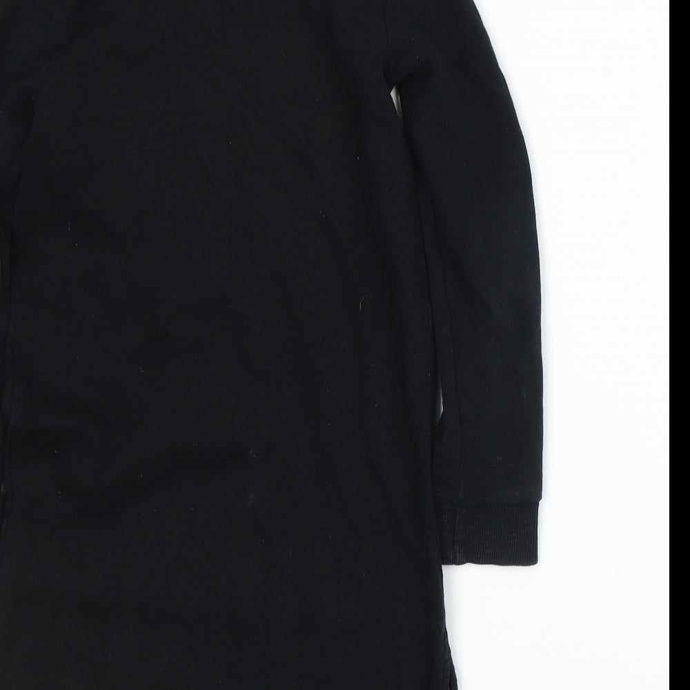 Brand and care label for Next girls’ black basic t-shirt, size 6, years