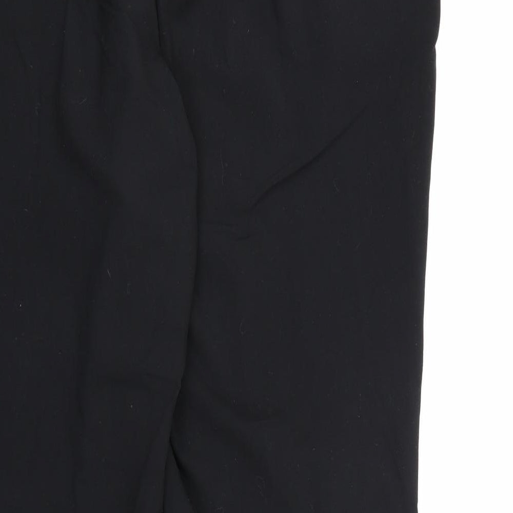 Brand and care label for Marks & Spencer women’s black rayon dress pants trousers, size UK 18, 28-inch leg