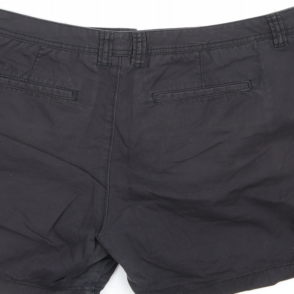 Brand and care label for F&F women’s black chino shorts