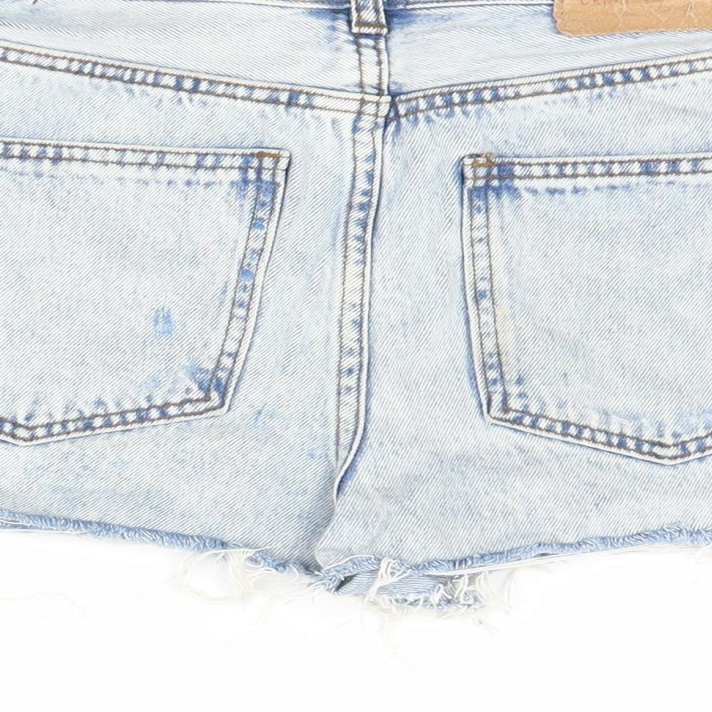 Brand and care label for Pull&Bear women’s blue denim cut-off shorts, size UK 32, in