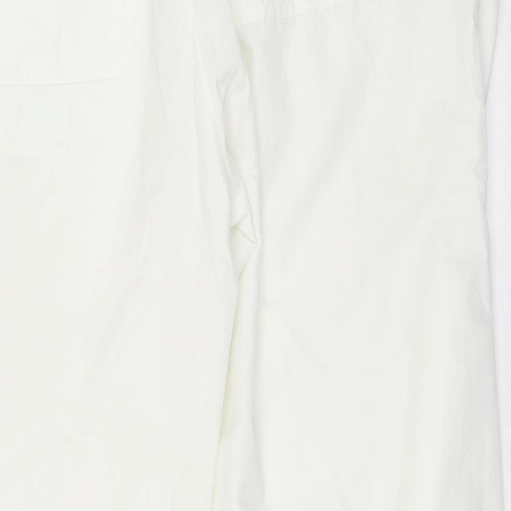 Brand and care label for CMD women’s white sweatpants, size UK 44, 27-inch leg