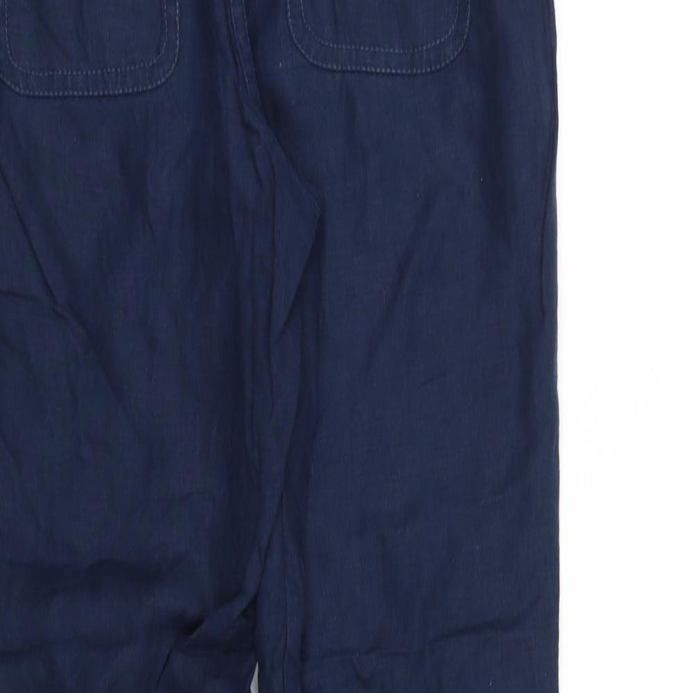 Brand and care label for liz calbri women’s blue trousers, size M, 31-inch leg
