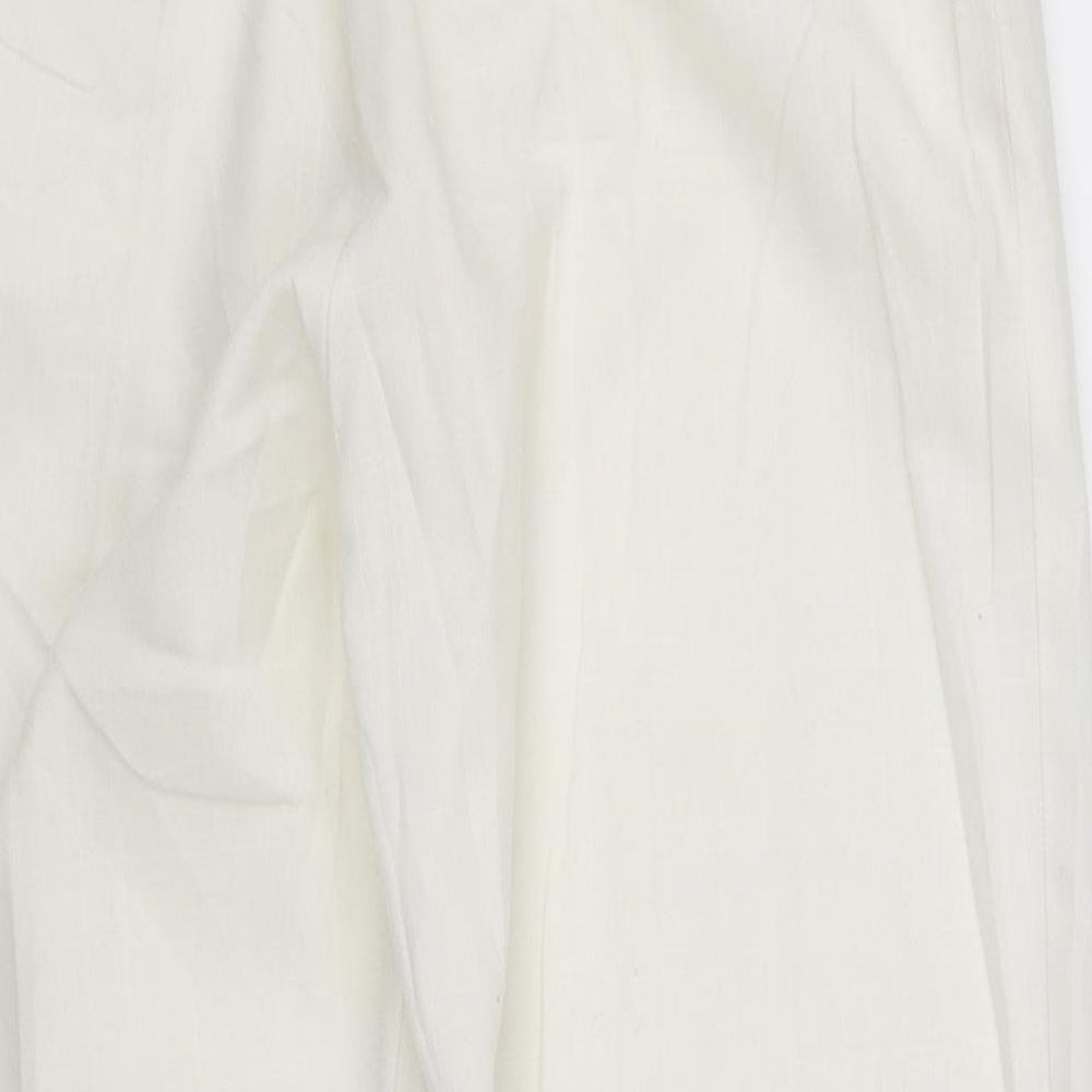 Brand and care label for pre worn women’s silver trousers, size UK 14, 28-inch leg