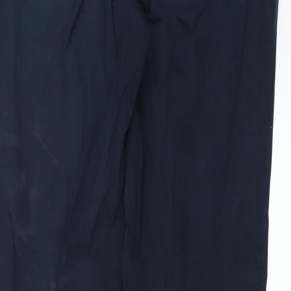 Brand and care label for Toni Dress women’s blue trousers, size UK 36, in, 28-inch leg