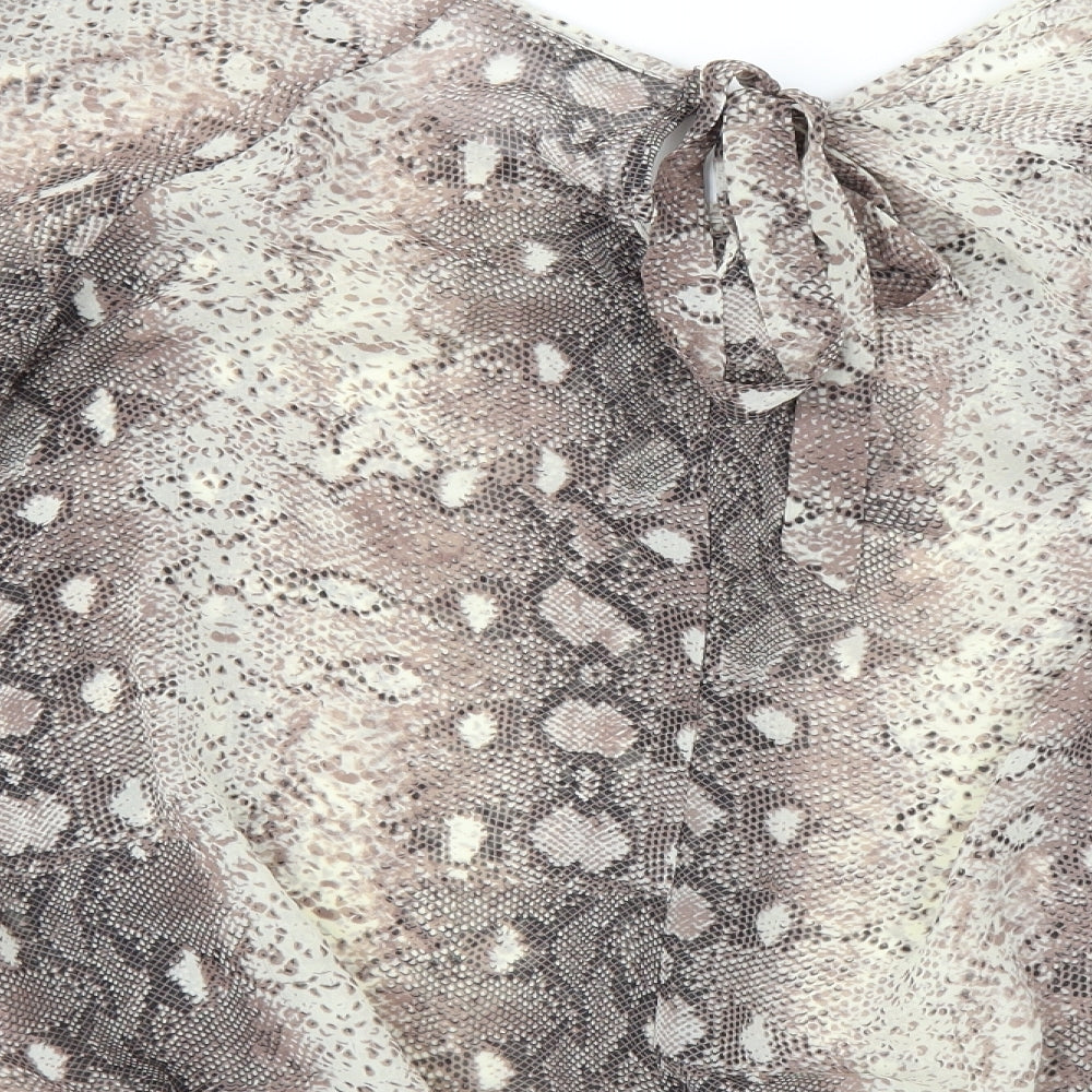 Brand and care label for Wallis women’s brown animal print basic blouse, size M