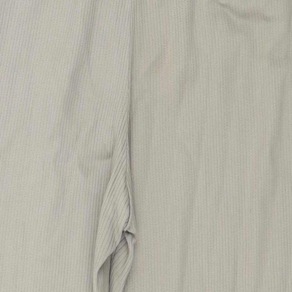Brand and care label for Preworn women’s beige trousers, size UK 28, in, 28-inch leg