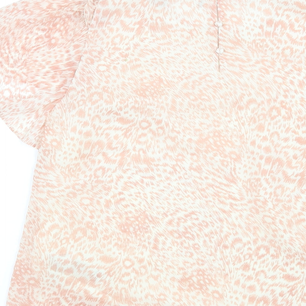 Brand and care label for Preworn women’s pink animal print basic blouse, size UK 10